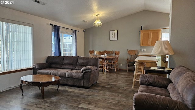 4072 Forsythia St, Springfield, OR 97478 - living room with dark wood finished floors, lofted ceiling, and baseboards