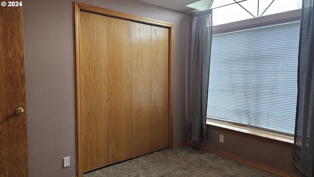 4072 Forsythia St, Springfield, OR 97478 - unfurnished bedroom featuring carpet floors, a closet, and baseboards