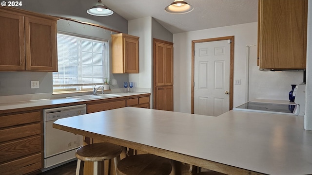 4072 Forsythia St, Springfield, OR 97478 - kitchen with white dishwasher, a sink, stove, a breakfast bar area, and light countertops