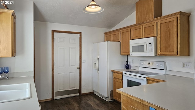 4072 Forsythia St, Springfield, OR 97478 - kitchen featuring white appliances, a sink, dark wood-style floors, light countertops, and brown cabinets
