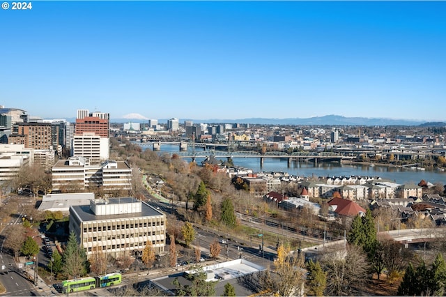 exterior space featuring a water and mountain view