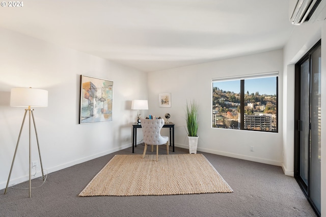 home office with dark carpet and a wall mounted AC