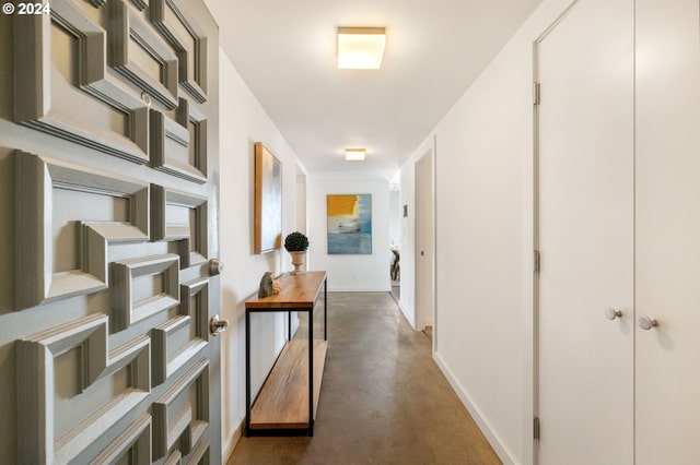 2221 SW 1st Ave Unit 1622, Portland, OR 97201 - corridor with concrete floors and baseboards