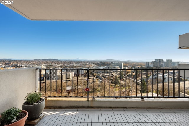 balcony featuring a mountain view