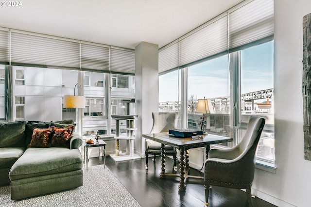 1930 S River Dr Unit W107, Portland, OR 97201 - dining space featuring wood finished floors, baseboards, and expansive windows