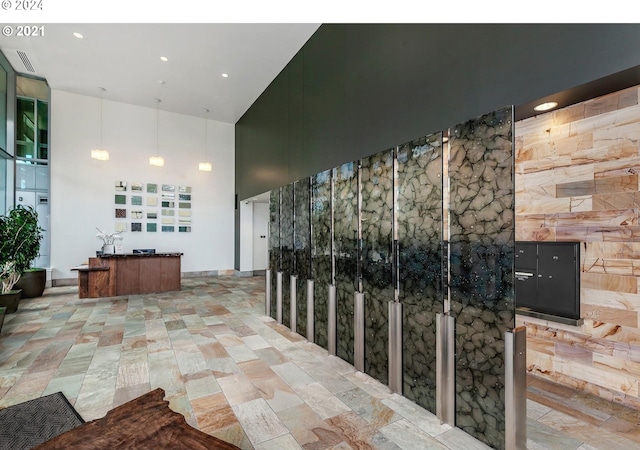 1930 S River Dr Unit W107, Portland, OR 97201 - hall with visible vents and a high ceiling