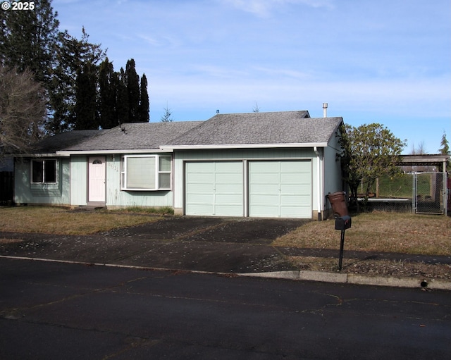 single story home with a garage