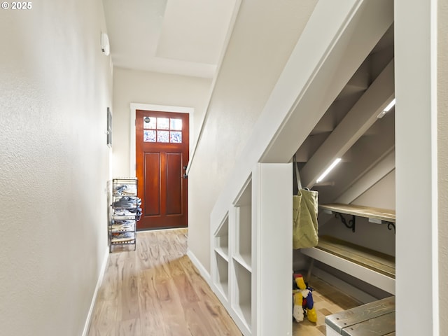 foyer entrance with light wood-type flooring