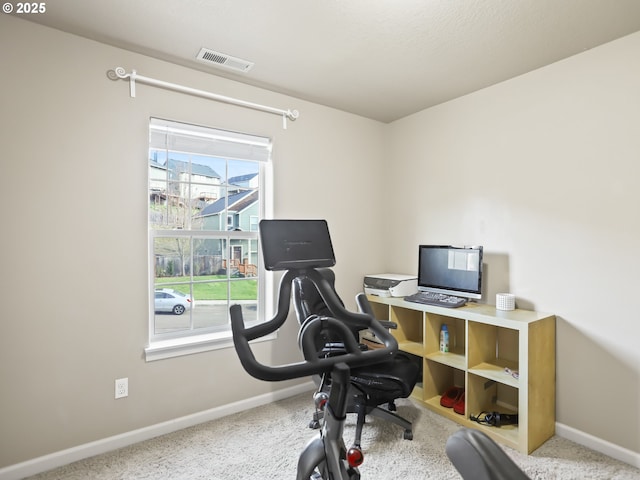 office area with carpet, visible vents, and baseboards