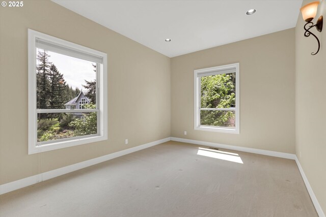 unfurnished room featuring baseboards, carpet, and recessed lighting