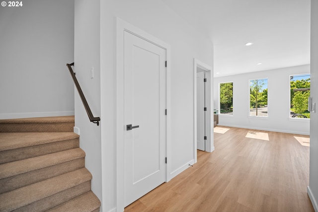 hallway with light wood-type flooring