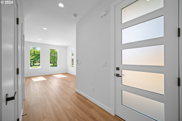 entryway with light hardwood / wood-style floors