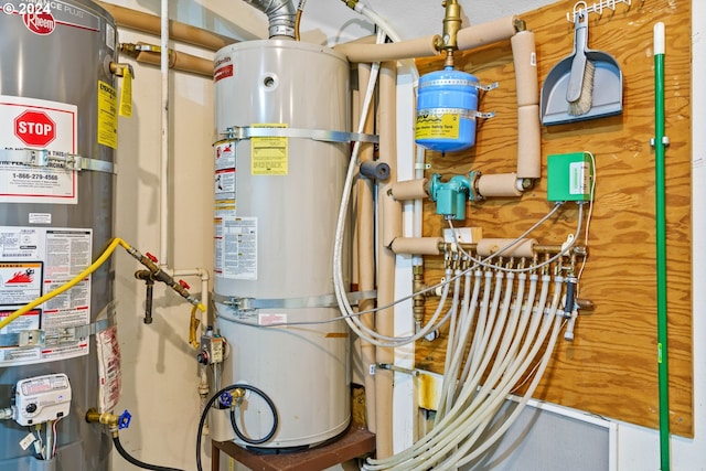 utility room featuring water heater