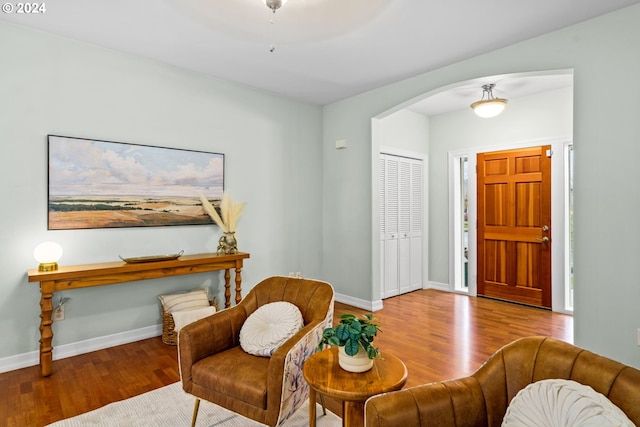 sitting room with light hardwood / wood-style flooring