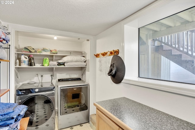 11635 NW Seavey Rd, Forest Grove, OR 97116 - washroom with washer and dryer and a textured ceiling