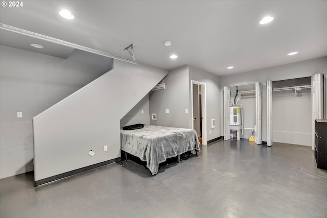 11635 NW Seavey Rd, Forest Grove, OR 97116 - bedroom with recessed lighting, baseboards, concrete floors, and two closets