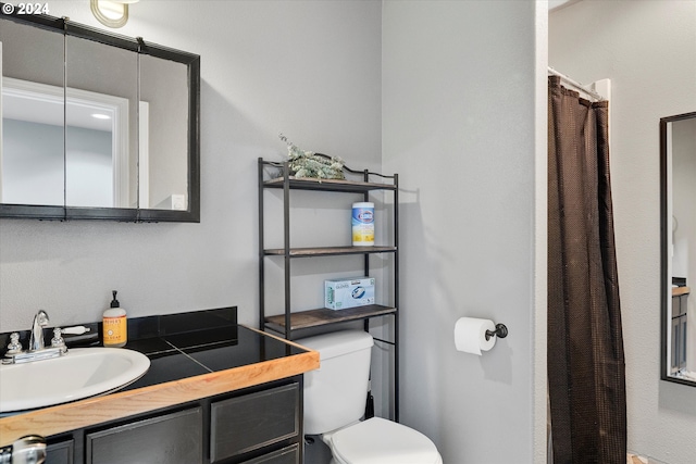 11635 NW Seavey Rd, Forest Grove, OR 97116 - bathroom featuring vanity, toilet, and a shower with shower curtain