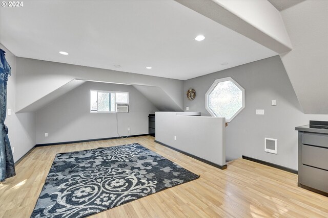 11635 NW Seavey Rd, Forest Grove, OR 97116 - additional living space with wood finished floors, baseboards, recessed lighting, and cooling unit