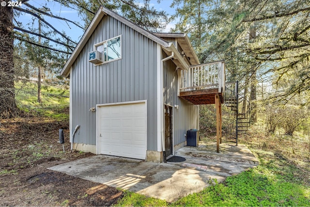 11635 NW Seavey Rd, Forest Grove, OR 97116 - view of side of home with stairs, board and batten siding, a deck, and a garage
