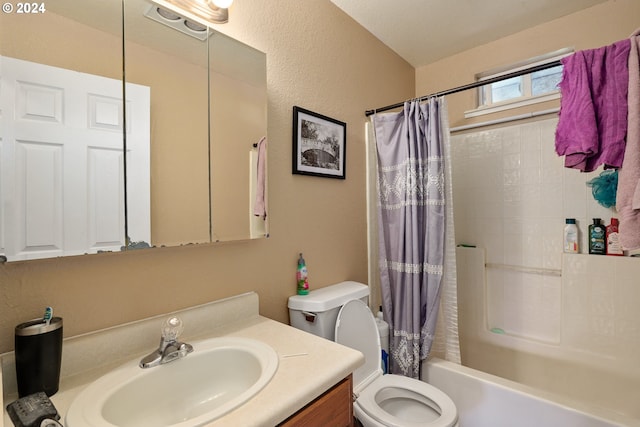 full bathroom with shower / tub combo, vanity, and toilet