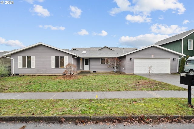 ranch-style home with a garage and a front yard