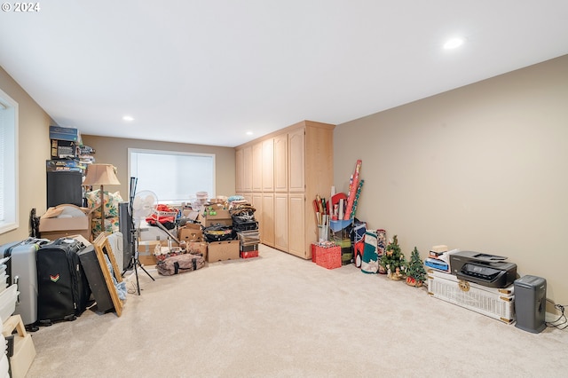 game room with light carpet