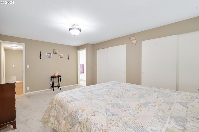 18095 Bluff Rd, Sandy, OR 97055 - bedroom featuring multiple closets and light colored carpet