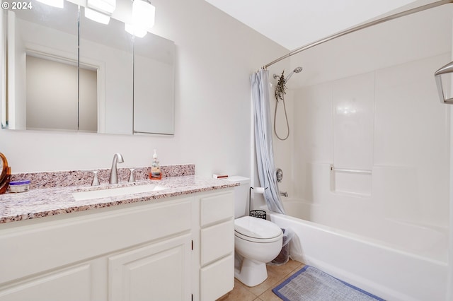 full bathroom with toilet, vanity, tile patterned floors, and shower / bath combo with shower curtain