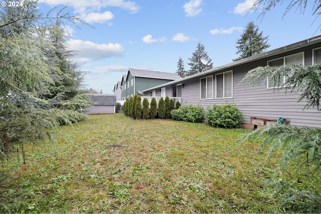 18095 Bluff Rd, Sandy, OR 97055 - view of green lawn featuring a storage unit