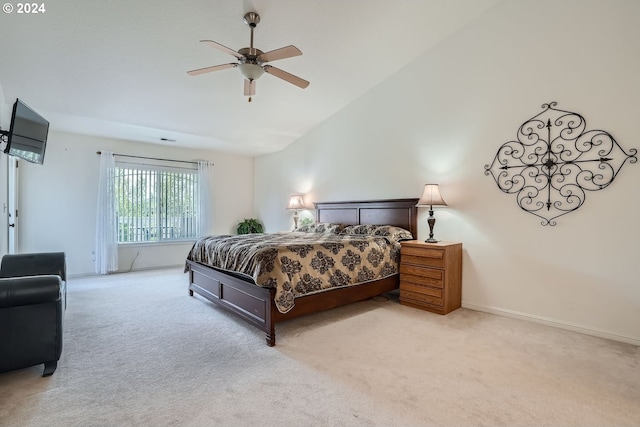 bedroom with lofted ceiling, ceiling fan, and carpet floors