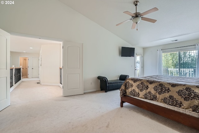 bedroom featuring ceiling fan, light carpet, and vaulted ceiling