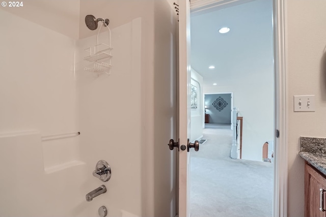 bathroom with vanity and shower / bath combination