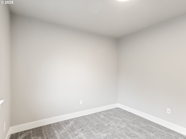 unfurnished room with carpet floors