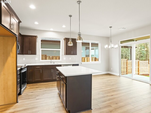 unfurnished living room featuring a fireplace, ceiling fan, and hardwood / wood-style floors