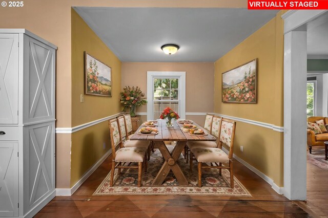 kitchen featuring open shelves, light countertops, dark wood finished floors, stainless steel appliances, and ornamental molding
