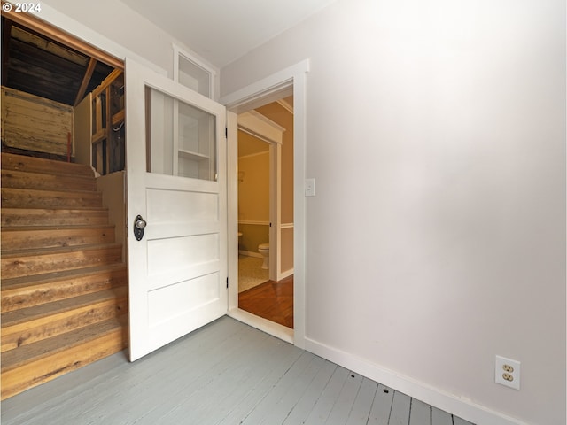 hall featuring hardwood / wood-style flooring