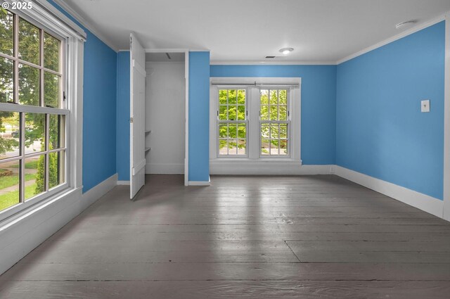 bathroom featuring visible vents, vanity, wood finished floors, toilet, and baseboards