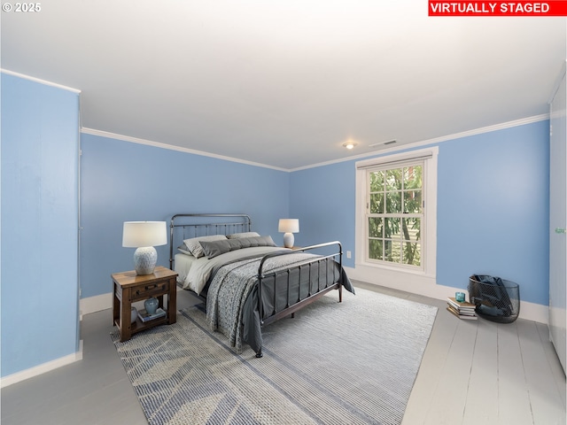 bedroom featuring ornamental molding