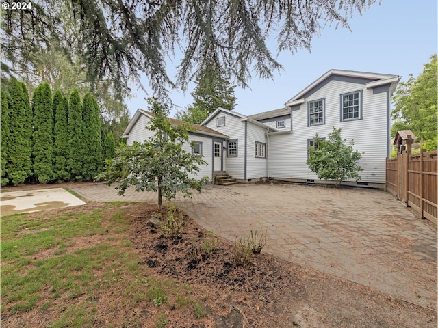 view of front of home with a patio area