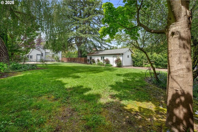 view of yard featuring a patio area and fence