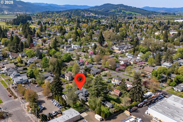 bird's eye view featuring a residential view and a mountain view
