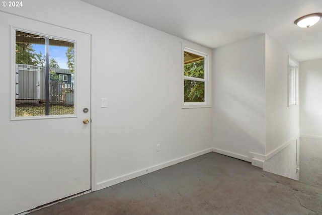 doorway to outside featuring a wealth of natural light