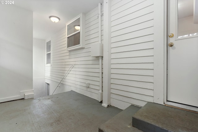 bathroom featuring concrete flooring