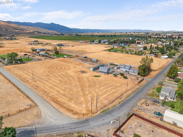 bird's eye view with a mountain view and a rural view