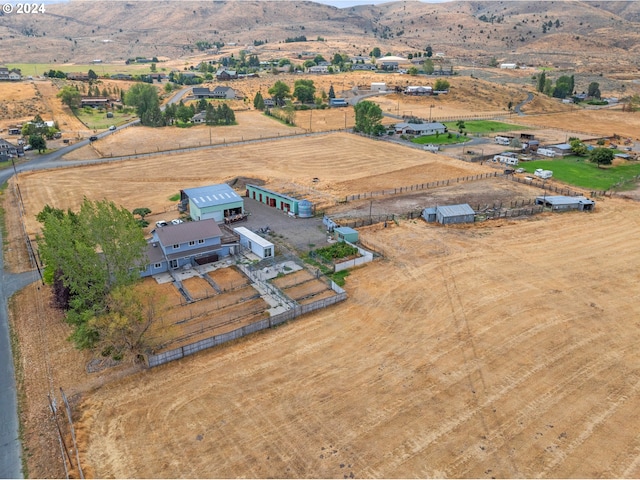 aerial view with a mountain view and a rural view