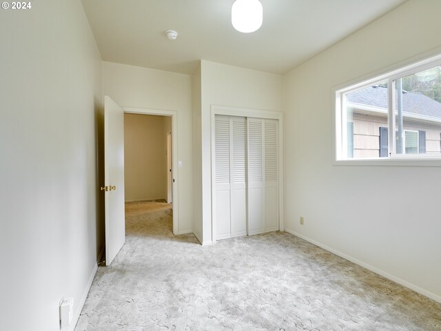 328 Mill St, Silverton, OR 97381 - unfurnished bedroom featuring baseboards, carpet flooring, and a closet