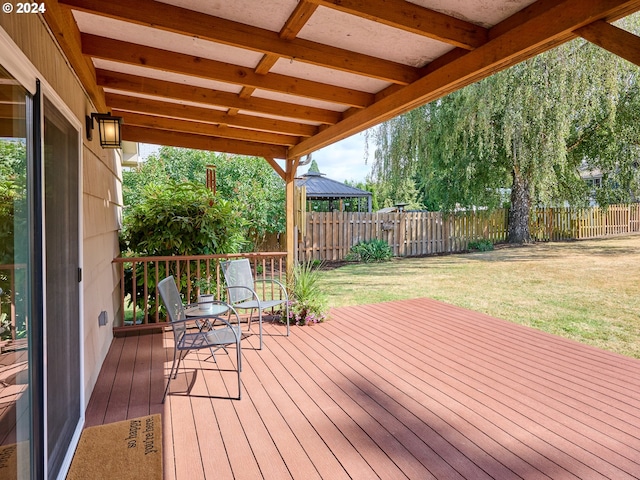 wooden deck with a yard