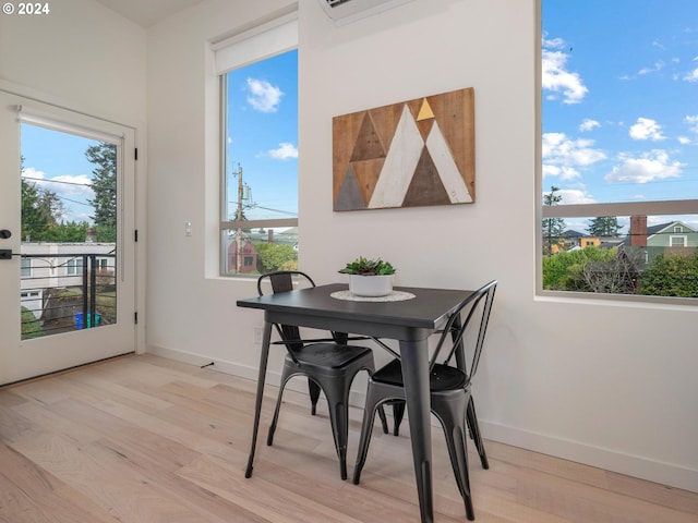 dining space featuring light hardwood / wood-style flooring