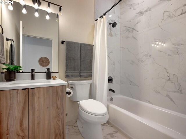 6610 N Greenwich Ave Unit 5, Portland, OR 97217 - bathroom with toilet, vanity, marble look tiles, and shower / bath combo