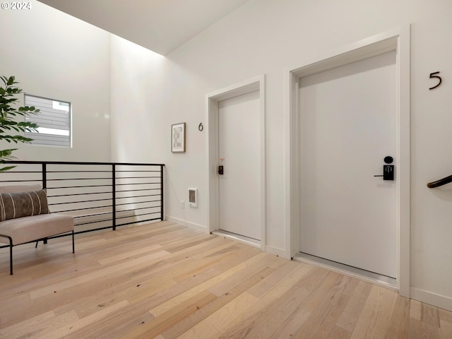 foyer entrance featuring light hardwood / wood-style flooring